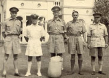 Men standing in line.