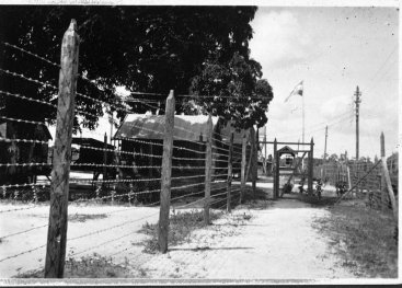 Prison with a high fence.